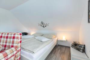 Postel nebo postele na pokoji v ubytování Ferienhaus Dohle