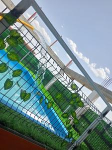 Swimmingpoolen hos eller tæt på Location Appartement avec Piscine