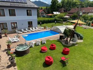 an image of a backyard with a swimming pool at Apartmán na Liptove in Liptovský Mikuláš