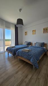 Ένα ή περισσότερα κρεβάτια σε δωμάτιο στο Villa Val