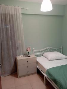 Ένα ή περισσότερα κρεβάτια σε δωμάτιο στο V&V Appartement