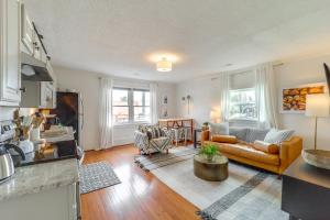 a living room with a couch and a table at Shop, Dine and Unwind Dtwn Blowing Rock Retreat! in Blowing Rock