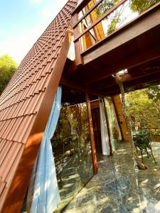 En balkon eller terrasse på Pousada paz e tranquilidade Chalé Lua Cheia