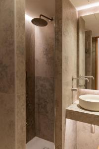 a bathroom with a shower and a sink at Enea Living in Bilbao +43 photos