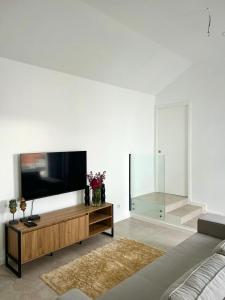 TV a/nebo společenská místnost v ubytování Casa Happy