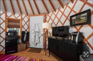 a room with a door in a yurt at Rustic Luxe Yurt- Unit #1 in Woodway