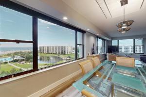 a dining room with a view of the ocean at The Aquarium in Sarasota