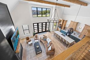 an overhead view of a living room and dining room at NEW Spacious Clarkson Getaway w Games & Yard in Clarkson