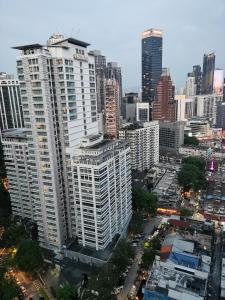 an aerial view of a city with tall buildings at Seri Bukit Ceylon Kuala Lumpur in Kuala Lumpur +26 photos