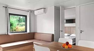 Et opholdsområde på Séjour famille Camping 5 étoiles