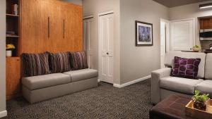 a living room with a couch and a chair at Marriott's StreamSide - Birch Studio Apartment with Resort Access in Vail