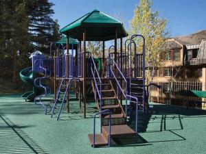 a playground with a slide in a park at Marriott's StreamSide - Birch Studio Apartment with Resort Access in Vail +12 photos