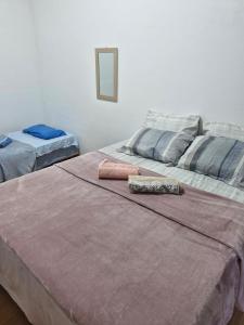 Ένα ή περισσότερα κρεβάτια σε δωμάτιο στο Casarão Maracanã +20 φωτογραφίες