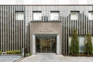 a building with a sign that reads tokyoify at Tokyu Stay Ikebukuro in Tokyo