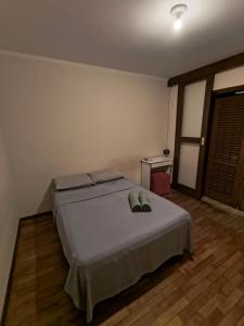 Postel nebo postele na pokoji v ubytování Quarto Duplo Aero Congonhas