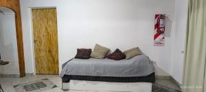 Ένα ή περισσότερα κρεβάτια σε δωμάτιο στο Los Nyck's