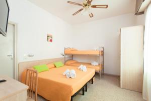 Postel nebo postele na pokoji v ubytování Hotel Niagara