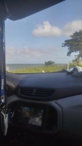 a dashboard of a car with a view of a field at Casa de Praia Lucena - 350m da praia in Lucena