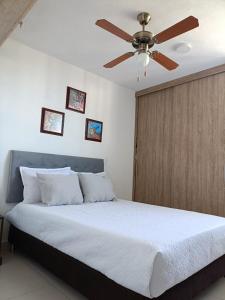 Postel nebo postele na pokoji v ubytování Excelente vista!, piso 12 cerca a playa