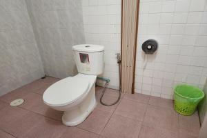 a bathroom with a white toilet in a stall at My Pumpkin Bungalow Krabi in Krabi +83 photos