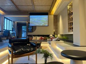 Posezení v ubytování Nature Eco Designer Hotel--Avatar mountain view,Bubble Pool,Free shuttle to south gate of Park Entrance,Local trip plan & Tourism Service,Full Renovation for 10 months + 56 fotografií