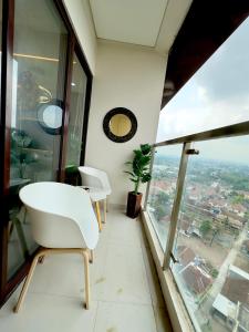 Gambar di galeri bagi Asha Suite by Patraland Amarta Apartemen di Kejayan +7 gambar