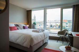 Postel nebo postele na pokoji v ubytování ABC Hotel