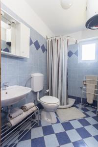 Koupelna v ubytování Apartments Roža + 37 fotografií
