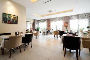 a dining room with tables and chairs in a restaurant at The Loft House Taksim in Istanbul