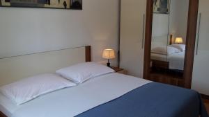 Postel nebo postele na pokoji v ubytování Apartment Klara