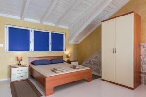 Voodi või voodid majutusasutuse Holiday Home Luna toas