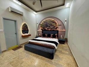 Postel nebo postele na pokoji v ubytování Meadow Suites