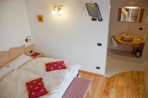 Postel nebo postele na pokoji v ubytování Agritur Golden Pause