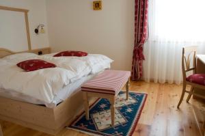 Postel nebo postele na pokoji v ubytování Agritur Golden Pause