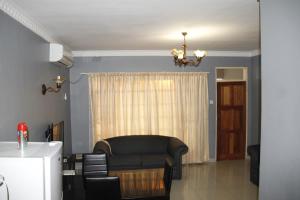 Posezení v ubytování Asante Apartments