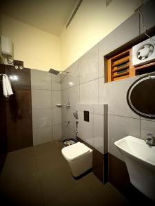 Koupelna v ubytování Riparian Inn Resort