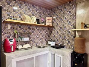 a kitchen with a sink and a counter top at LoftVibes San Juan - 2 in San Juan