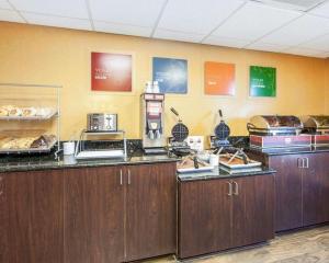 a kitchen with a bunch of food on the counter at Comfort Suites in Rome