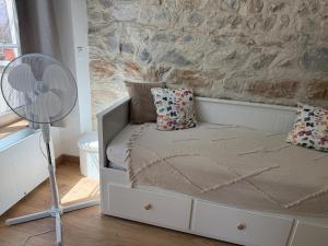 Postel nebo postele na pokoji v ubytování L Atelier Diderot