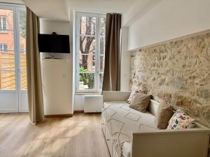 TV a/nebo společenská místnost v ubytování L Atelier Diderot