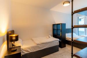 Postel nebo postele na pokoji v ubytování CasaVia BB02 mit Parkplatz bis zu 7 Personen zentral