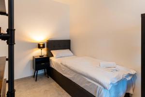 Postel nebo postele na pokoji v ubytování CasaVia BB02 mit Parkplatz bis zu 7 Personen zentral + 5 fotografií