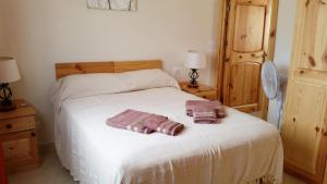 Postel nebo postele na pokoji v ubytování Tal-Marga B&B