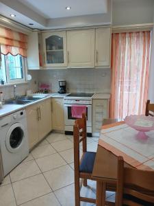 Η κουζίνα ή μικρή κουζίνα στο Deilino Apartment