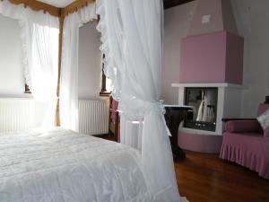 Postel nebo postele na pokoji v ubytování Mansion Theodora