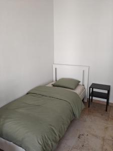 Katil atau katil-katil dalam bilik di All-in kamer te huur in Oostrozebeke
