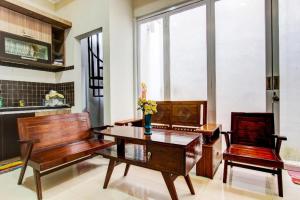 Khu vực ghế ngồi tại OYO 92479 Pasadena House +60 ảnh