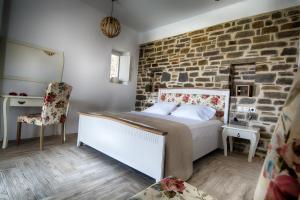 Posteľ alebo postele v izbe v ubytovaní Paros Afrodite Luxury Villas