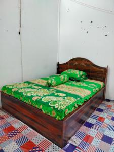 Ένα ή περισσότερα κρεβάτια σε δωμάτιο στο Atta komodo homestay