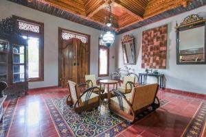 Posezení v ubytování SUPER OYO Collection O 2383 Andongkoe 64 Salatiga